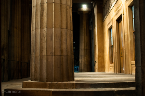 Fluted Greek Columns line the portico