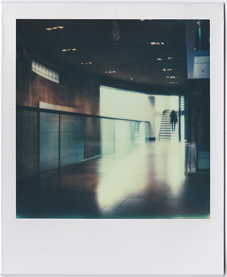 A Figure Decending Polaroid SX-70