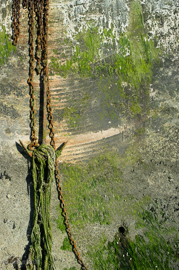 Notice the scrape marks on the wall where the chain swings