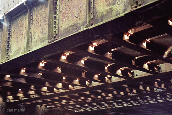 A gridwork of Iron Rivets and light