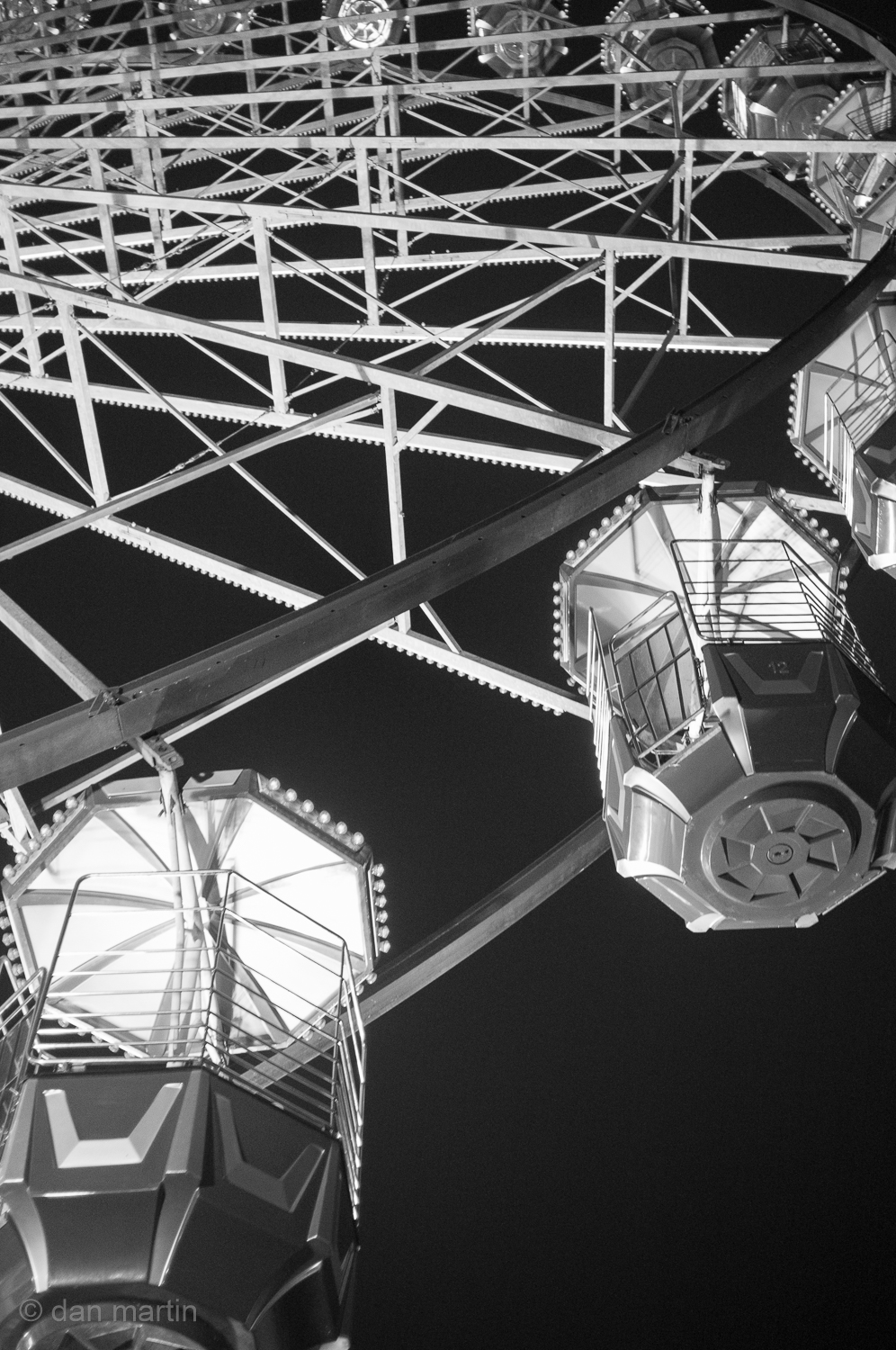 Looking up at a Ferris Wheel