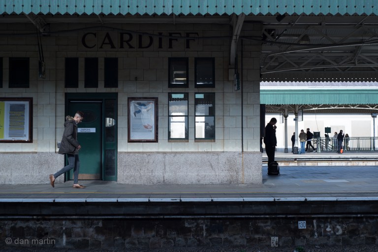There is always something wonderful about stations. A mid point, beginning or end of someone's journey. Always interesting moments to be had. I like the light and motion upon the man walking on the left, and the silhouette of the man on the right. 