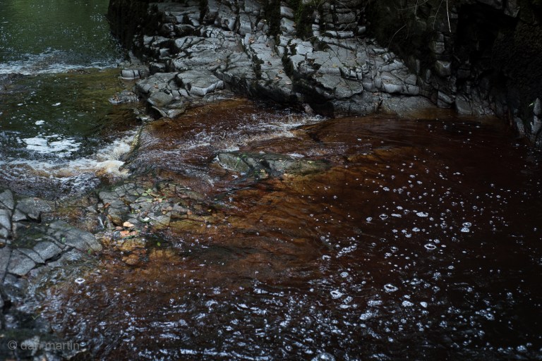 Love the oxide colours in the water against the shape and contrast of the rocks.